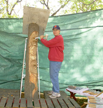 Elm Carving Duo in the Garden - Work in progress