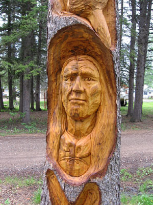 Spruce Carving Grey Owl in Waskesiu - Detailed View